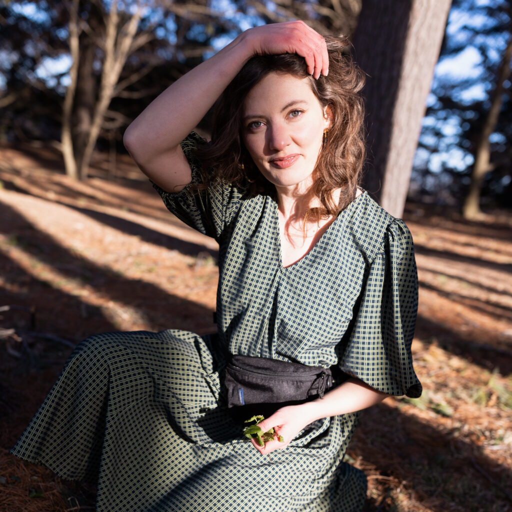 woman-kneeling-in-the-woods